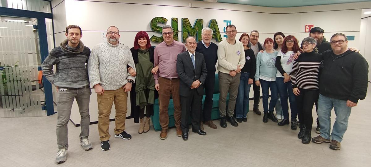 Representantes de CCOO en la mesa de negociacin, junto a miembros del SIMA